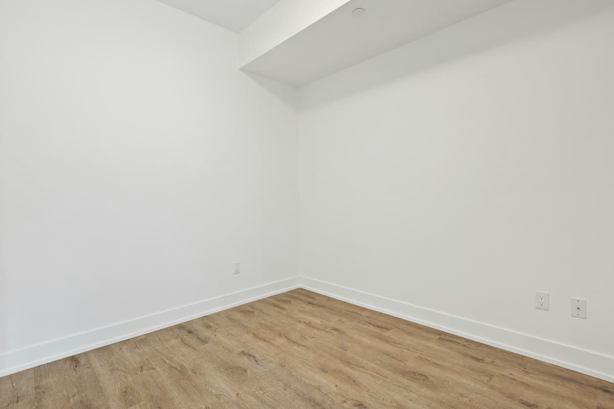 Freshly finished room with new hardwood flooring