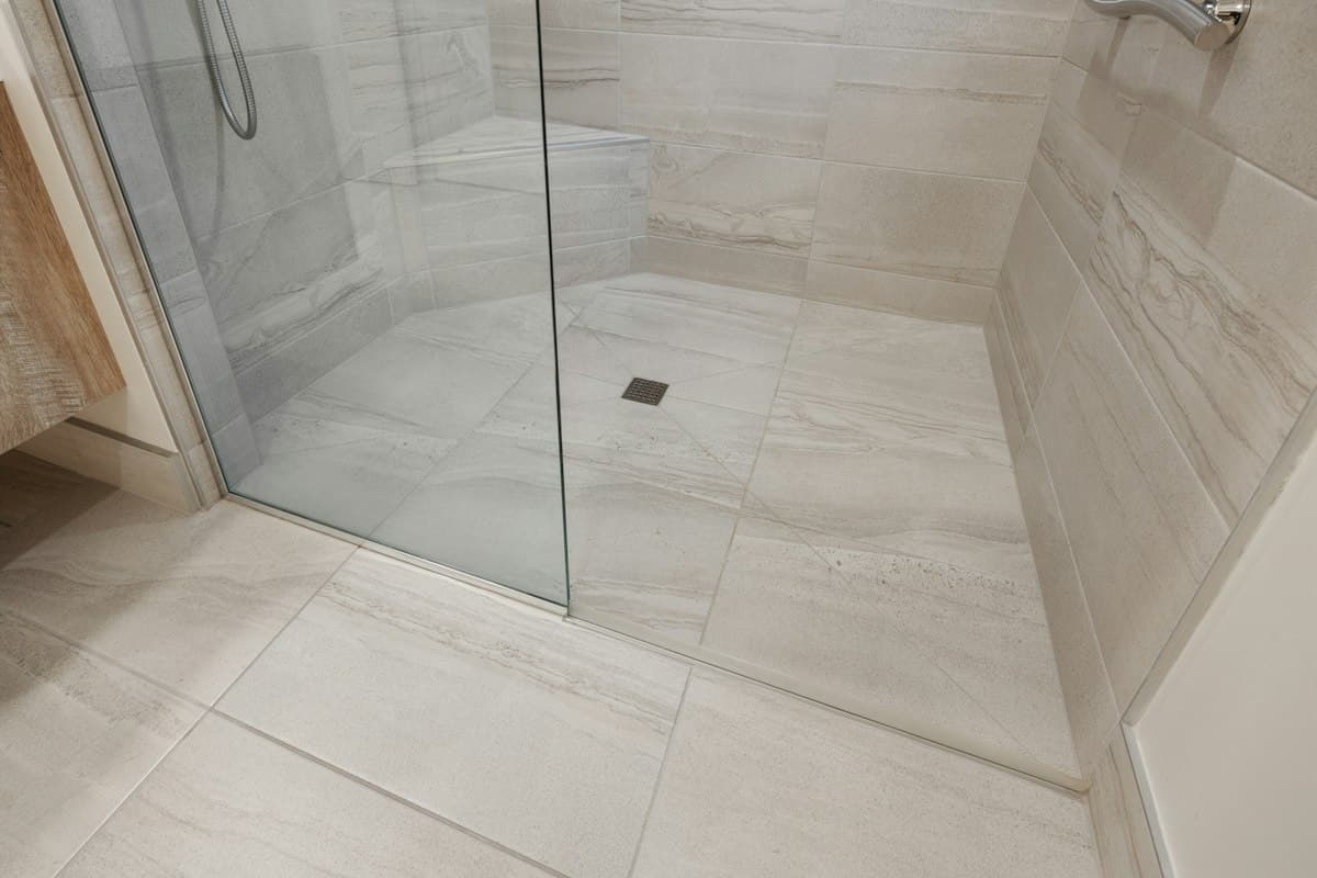 Walk-in shower with large-format tile